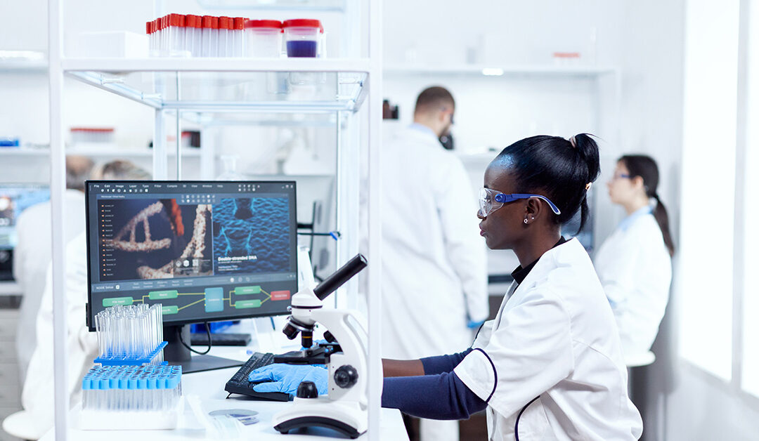 Researchers working in laboratory.